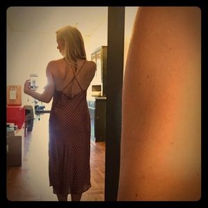 Midi length copper polka dot cross back dress